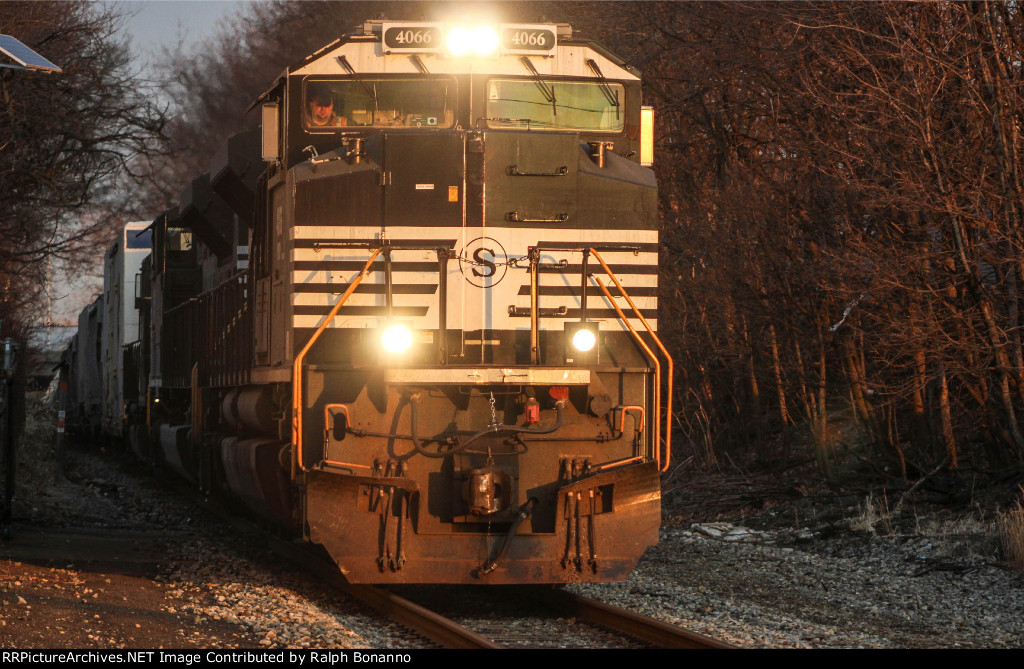 Westbound SU-99 into the winter sun with SD70M-2 4066 leading the way towards Binghamton